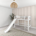 White loft bunk bed with slide in neutral children's bedroom with rattan pendant light, board-and-batten wall and potted plant