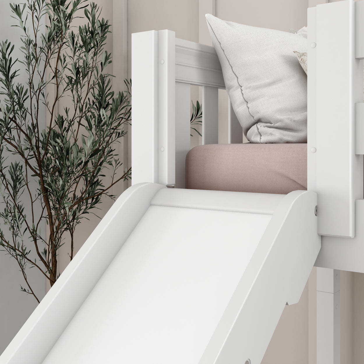White children's loft bed with slide and cozy cushions in a modern bedroom.