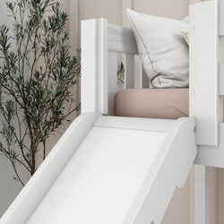 White children's loft bed with slide and cozy cushions in a modern bedroom.