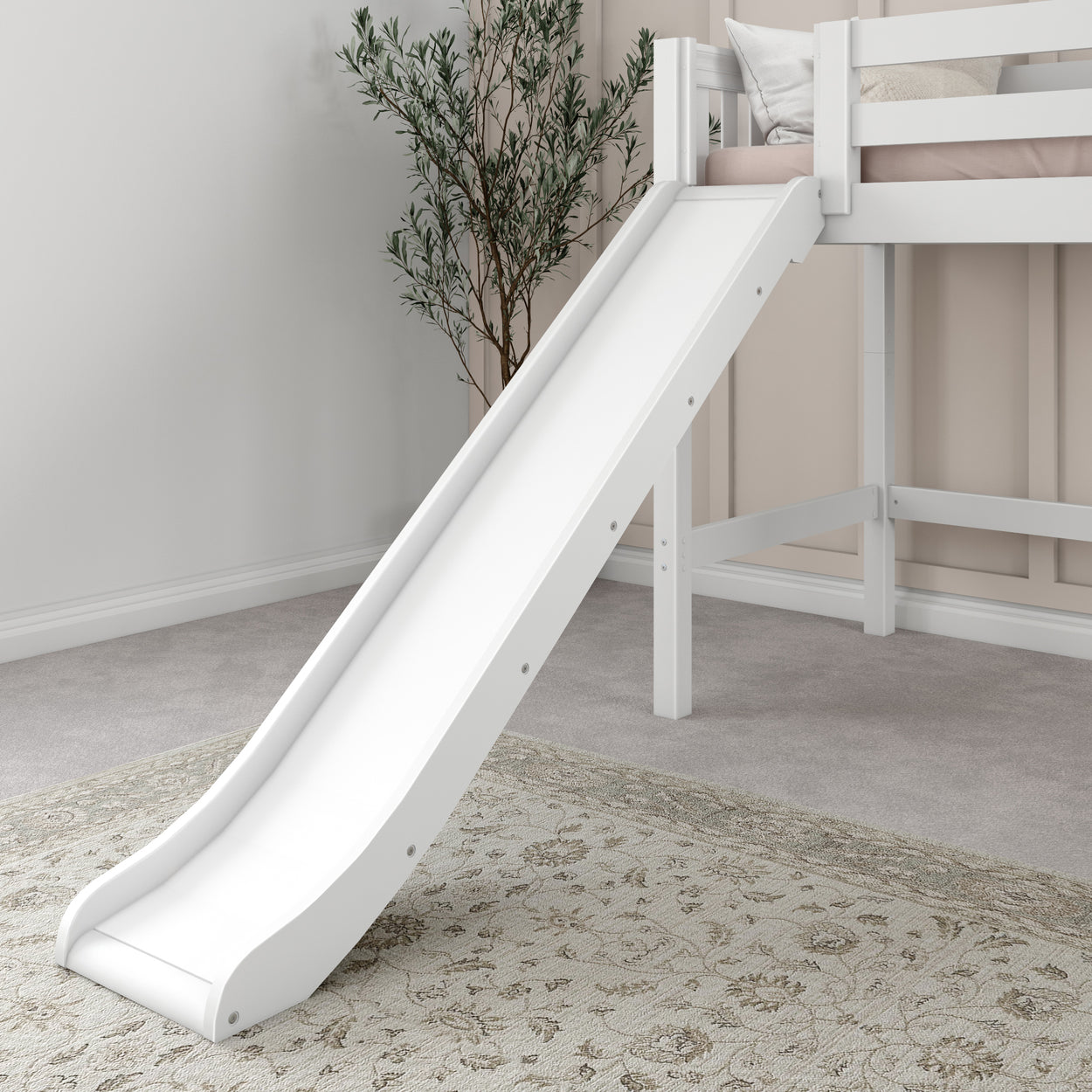 White loft bed with slide for kids in a cozy bedroom setting.