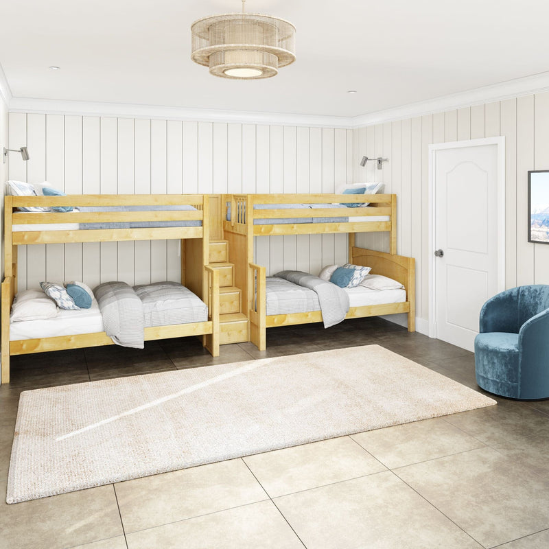 Cozy coastal-style kids' bedroom with twin-over-twin wooden bunk beds, built-in storage stairs, white shiplap walls, neutral rug, pendant ceiling light and blue accent chair