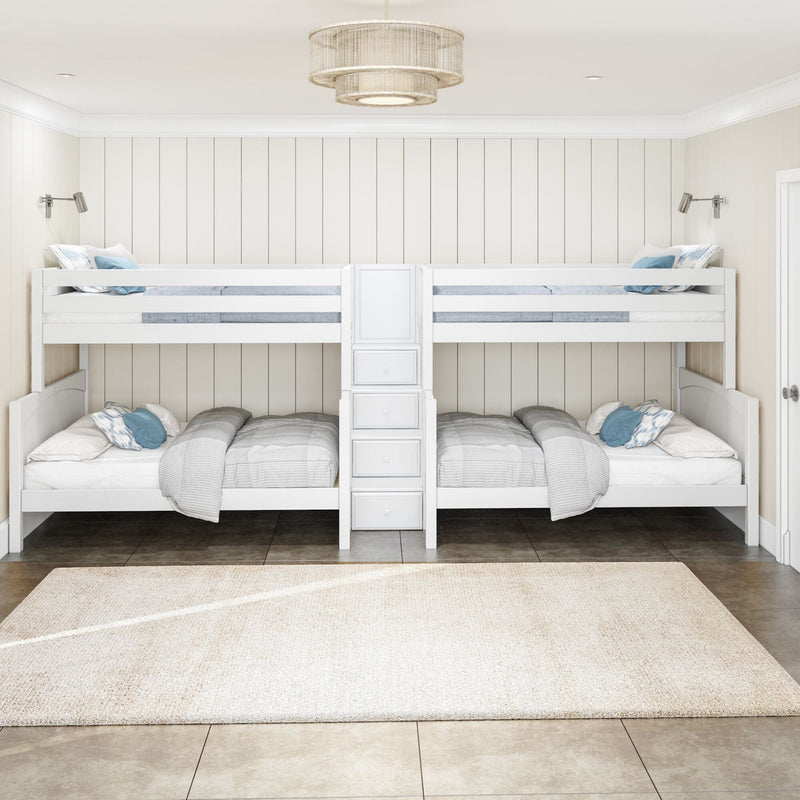 White twin-over-twin bunk beds with built-in storage ladder in bright coastal farmhouse kids' bedroom, neutral bedding and blue accent pillows under a modern pendant light