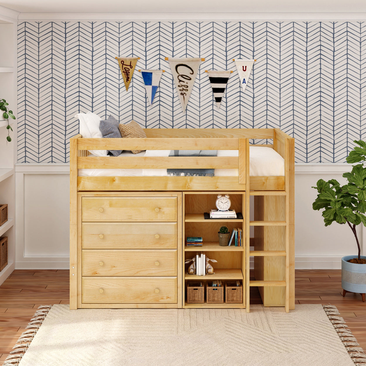 Wooden loft bed with storage drawers and ladder in a modern kids' bedroom with chevron wallpaper and decorative flags.