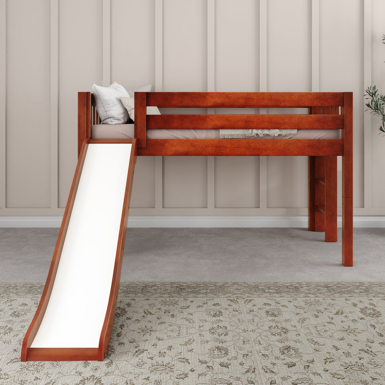 Loft bed with slide and wooden frame in modern children's bedroom.