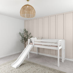 Modern children's bedroom with loft bed and slide, featuring minimalist decor and a natural wood pendant light.