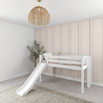 White children's loft bed with slide in a modern, minimalist bedroom featuring a rattan pendant light and a soft, patterned rug.