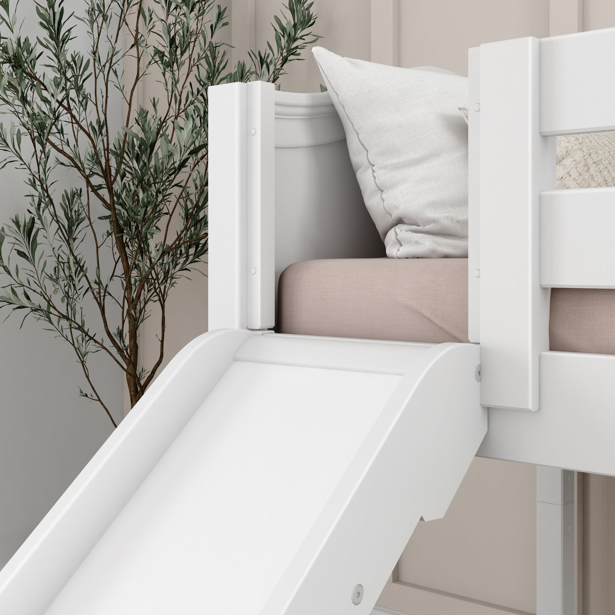 White children's loft bed with slide and cushion in a cozy bedroom setting.