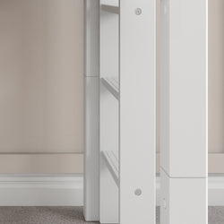 Modern white corner shelving unit in living room interior.