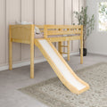 Natural wood loft bed with slide and ladder in a neutral kids' room with beige paneled wall, soft bedding, potted plant and window.