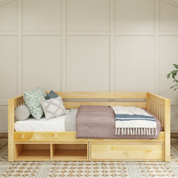 Wooden daybed with storage drawers, cozy pillows, and neutral bedding in a stylish bedroom.
