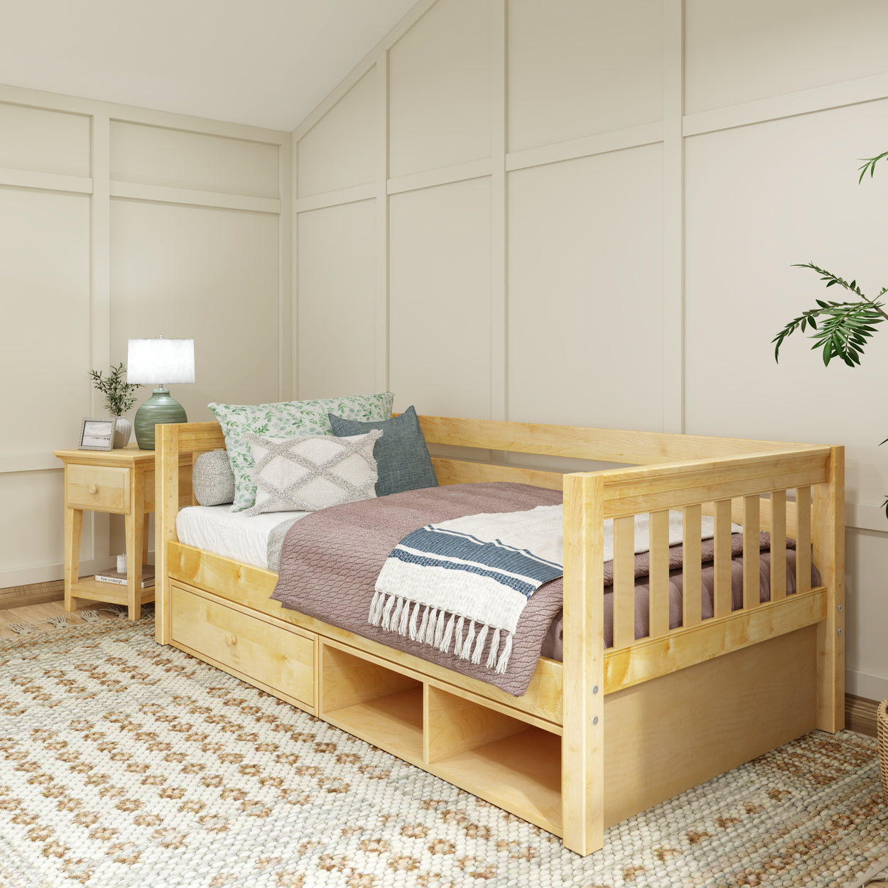 Cozy corner with wooden daybed featuring storage, decorative pillows, and a beige area rug in a modern bedroom setup.