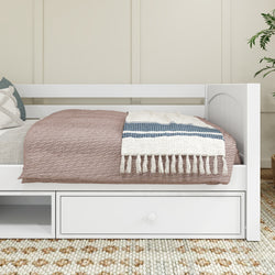 White daybed with blue and white striped blanket and storage drawer in modern bedroom.