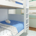 White wooden bunk bed with ladder, blue comforter and star-pattern sheets in modern children's bedroom