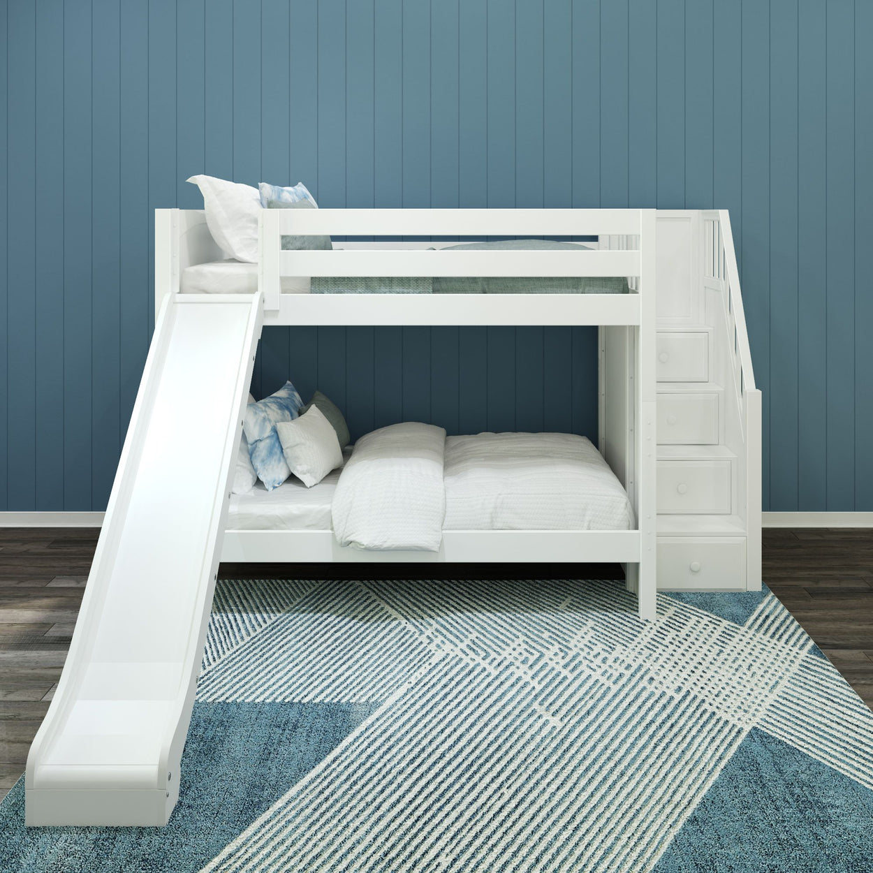 White wooden bunk bed with slide and staircase in a kids' bedroom with blue wall paneling.