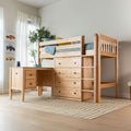 Solid natural wood kids loft bed with built-in desk, drawers and ladder, blue bedding, striped rug, potted plant and car wall art in a bright modern children's bedroom, space-saving storage solution