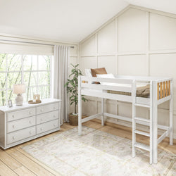 Cozy children's room with white loft bed and chest of drawers, featuring a large window and decorative plant.