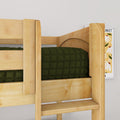 Solid wood bunk bed with natural pine finish and dark green quilted bedding, space-saving children's loft bed close-up