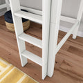 Close-up of a white wooden bunk bed ladder with slatted steps on oak hardwood floor beside a woven seagrass pouf and yellow striped rug in a modern kids' bedroom