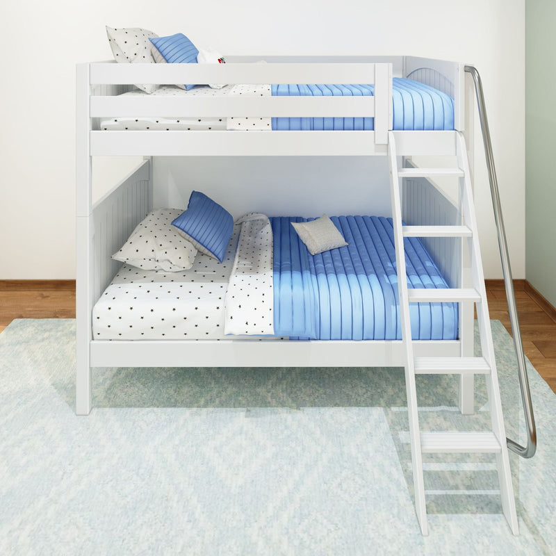 White wooden twin bunk bed with blue quilted bedding, star-pattern sheets and pillows, built-in ladder and chrome handrail in a modern kids' bedroom