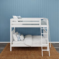 White twin-over-full kids bunk bed with ladder, grey and blue bedding against blue shiplap wall on woven jute rug