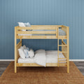 Light solid wood bunk bed with white and blue pillows and gray bedding against a blue paneled wall on a woven jute rug, modern kids bedroom decor