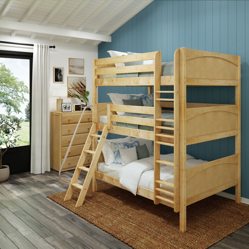 Natural wood bunk bed for kids in bright coastal-style bedroom with ladder, blue paneled accent wall, dresser, artwork and window view
