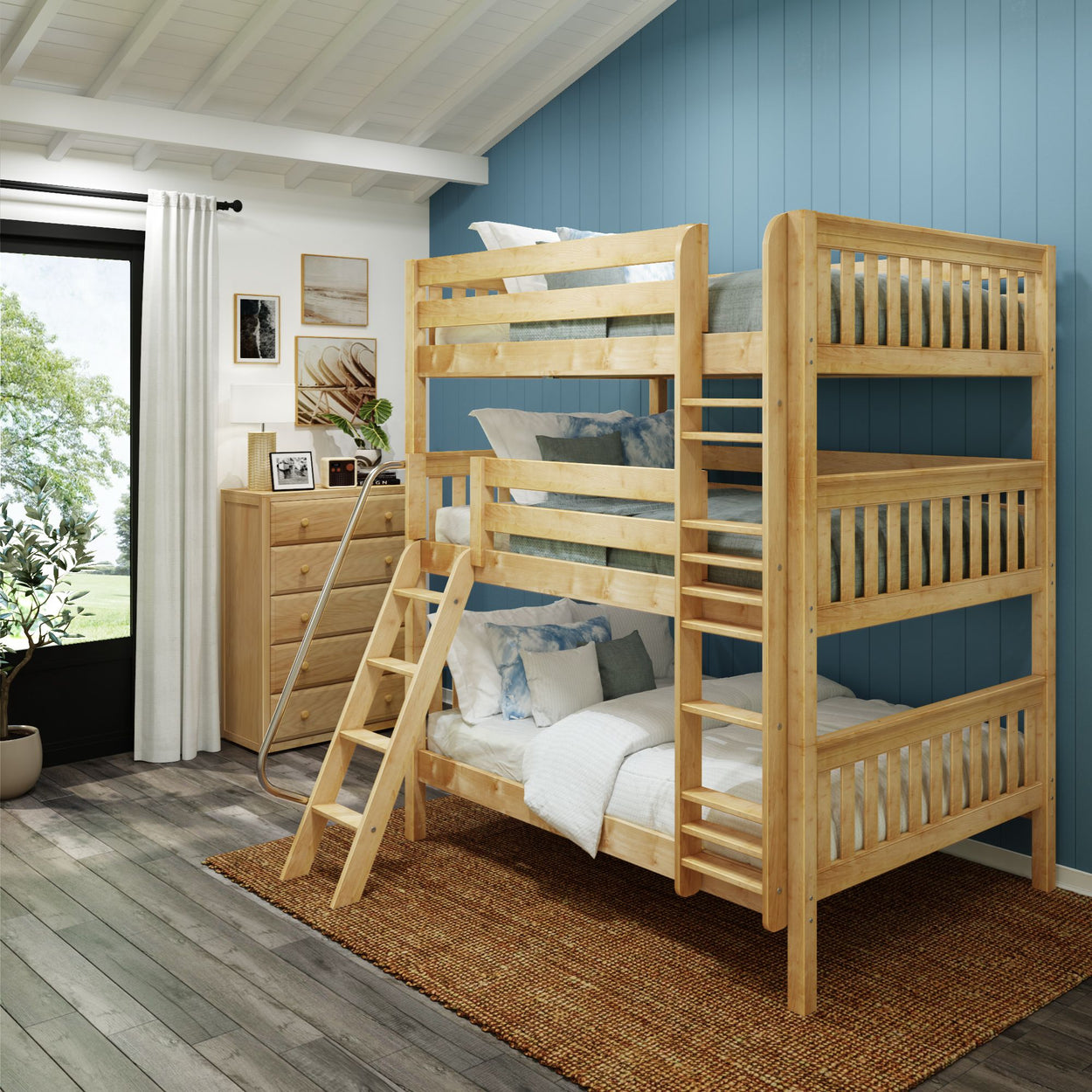 Three-tier wooden bunk bed in a cozy bedroom with blue walls and natural light.