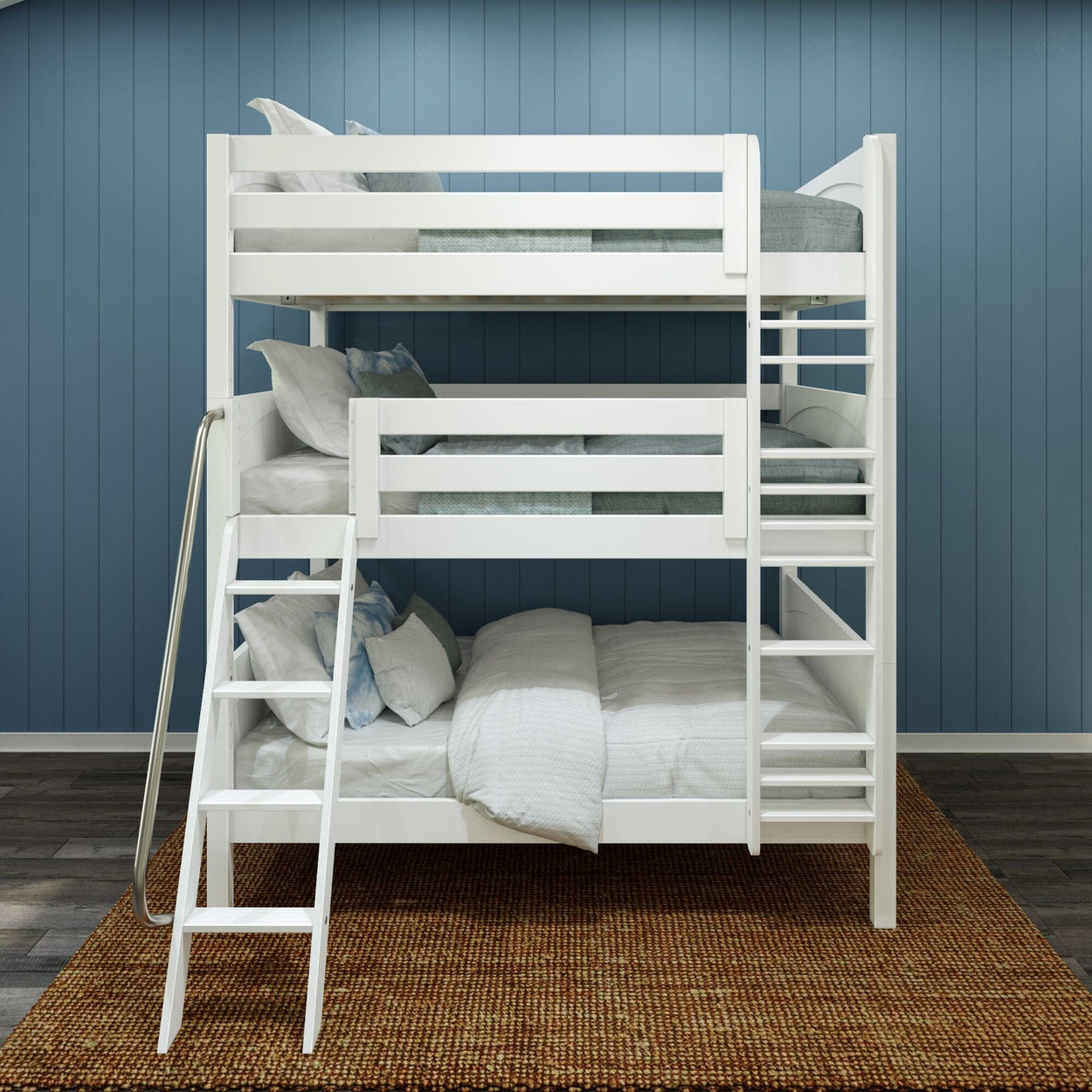 White wooden triple bunk bed with ladder and safety rails, gray-blue bedding in children's bedroom with blue paneled wall and woven brown rug