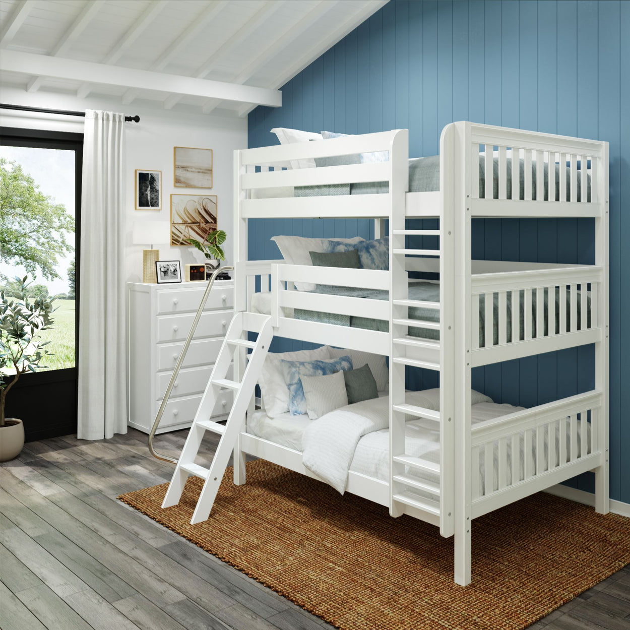 White triple bunk bed in a modern blue bedroom with wood flooring.