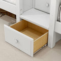 White under-bed storage drawer with maple interior and metal slide hardware, white knob on hardwood floor
