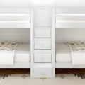 White twin bunk bed with built-in staircase and drawers, neutral bedding and patterned rug in modern kids' bedroom