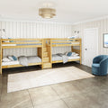 Cozy kids' bunk room with natural wood bunk beds, neutral shiplap walls, woven pendant light, blue accent pillows and a beige area rug