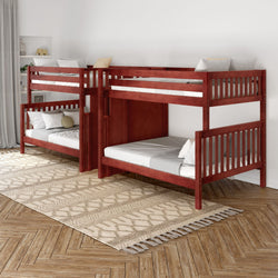Wooden bunk beds with white bedding in a modern bedroom featuring a geometric patterned rug and stylish decor.