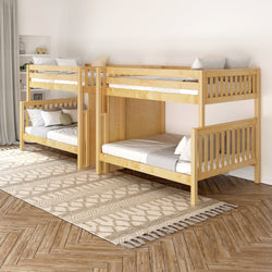 Natural wood bunk beds in a modern bedroom with geometric patterned rug.