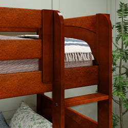 Wooden bunk bed with cozy bedding and decorative pillows in a modern bedroom setting.