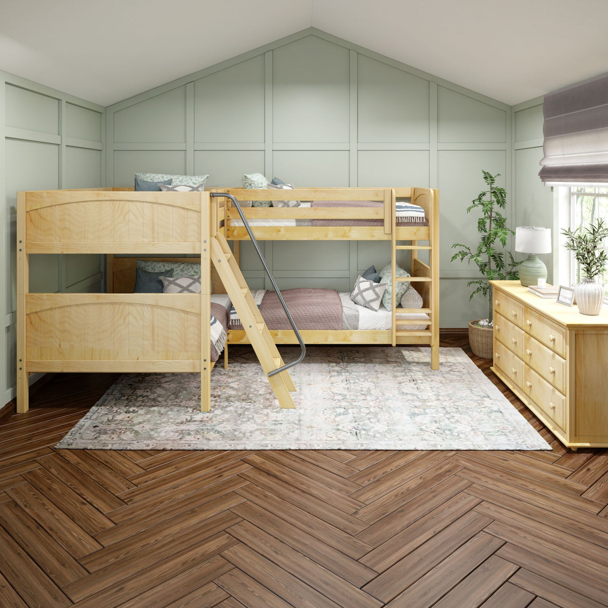 Cozy child’s bedroom with a modern wooden bunk bed, soft pastel green walls, and stylish herringbone wood flooring.