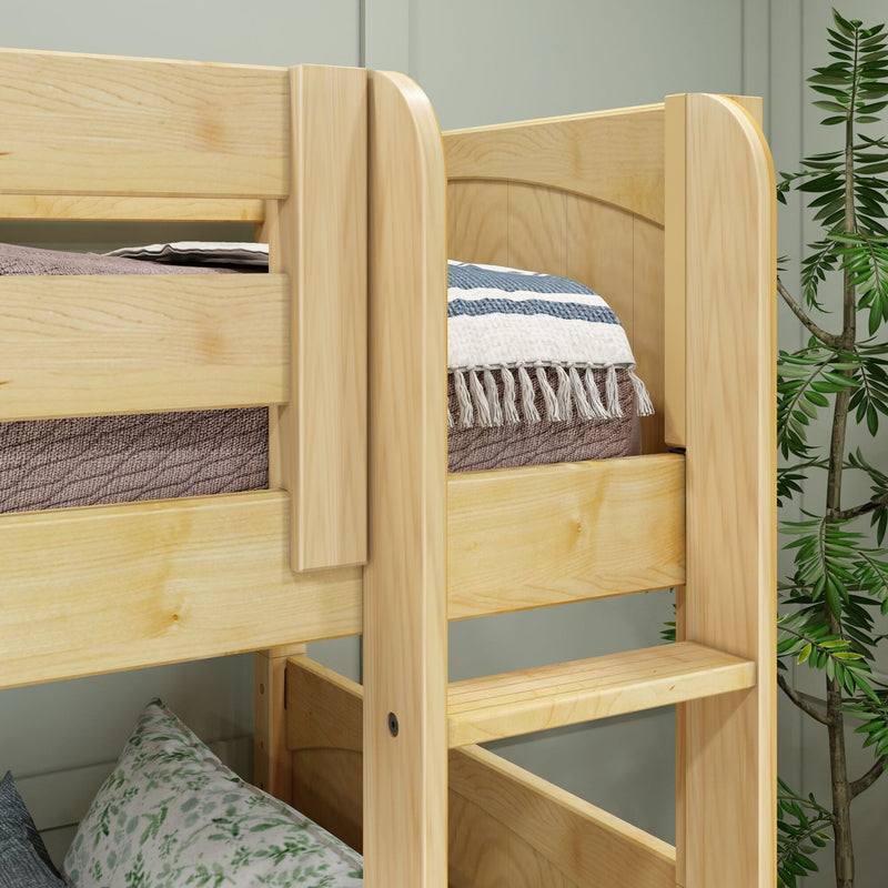 Close-up of a natural pine bunk bed ladder and safety rail in a modern kids' bedroom with striped blanket, textured mattress and potted plant