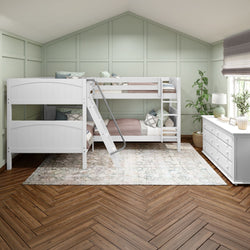 White bunk bed in a modern children's bedroom with green walls and wooden flooring.