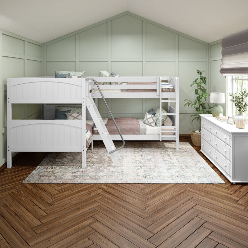 White wooden bunk beds in kids' bedroom with pale green paneled accent wall, herringbone hardwood floor, area rug, dresser and natural light