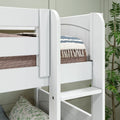 White wooden bunk bed ladder and guardrail close-up with blue-striped quilt, woven tassel throw and potted plant