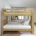 Solid natural pine twin-over-full bunk bed with white bedding and patterned pillows in a bright neutral bedroom — space-saving children's furniture