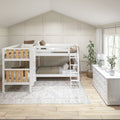 White wooden bunk bed in a bright neutral farmhouse-style kids bedroom with dresser, indoor plants, rug, and natural light