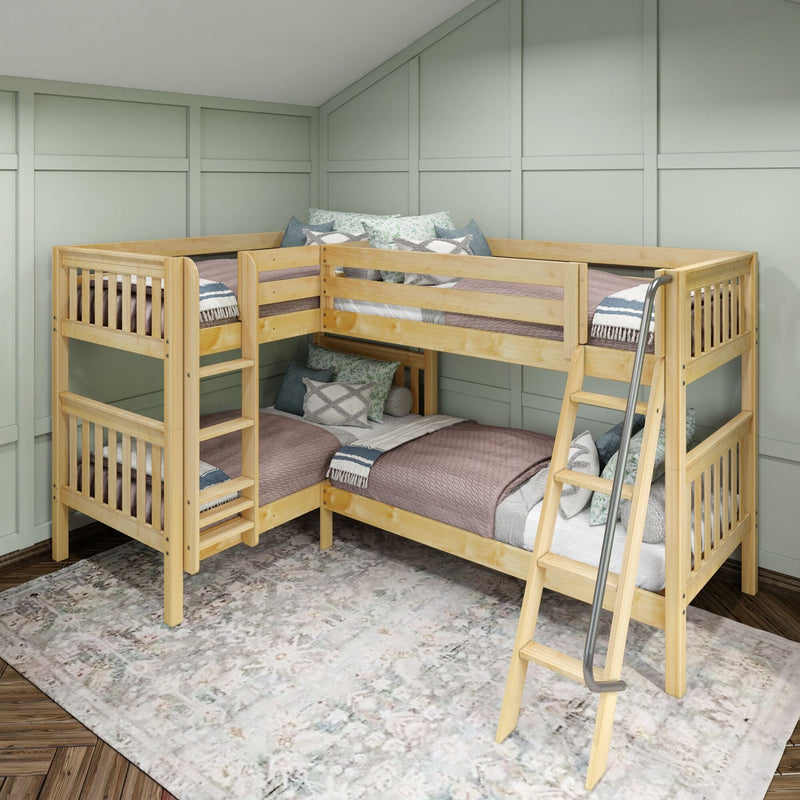 L-shaped natural wood bunk beds with ladder, cozy mauve quilts and decorative pillows in a kids' bedroom with mint green paneled walls