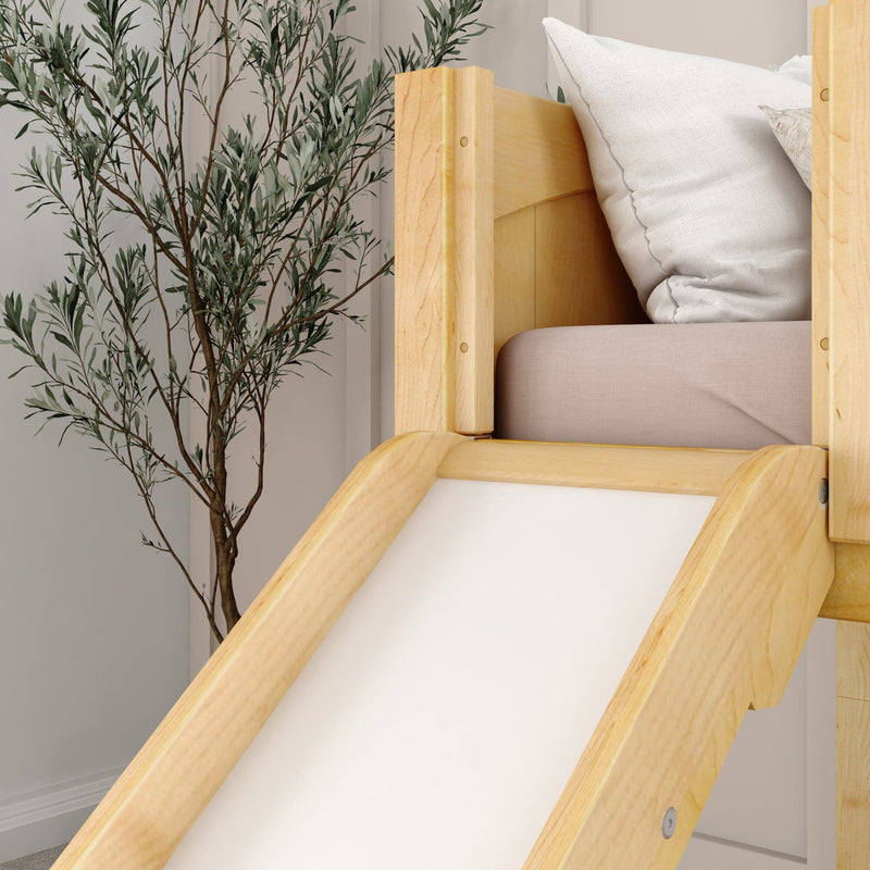 Natural wood kids bunk bed with built-in slide, white pillows and indoor plant in a minimalist nursery