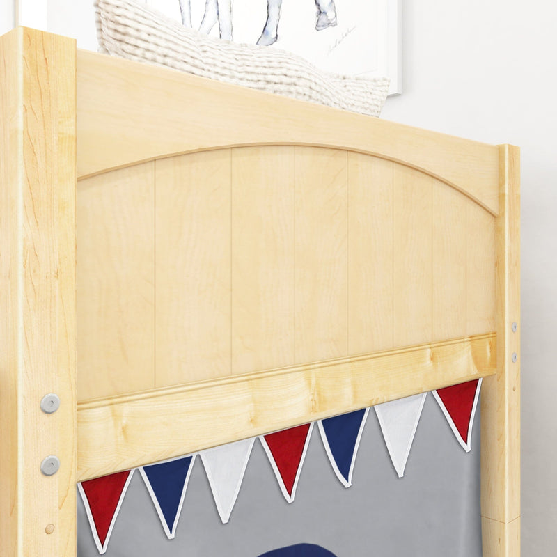 Close-up of light maple wood bunk bed headboard with red, white and blue triangular bunting in kids' bedroom nursery