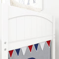 Close-up of white wooden bunk bed headboard with red, white and blue pennant bunting for kids room decor