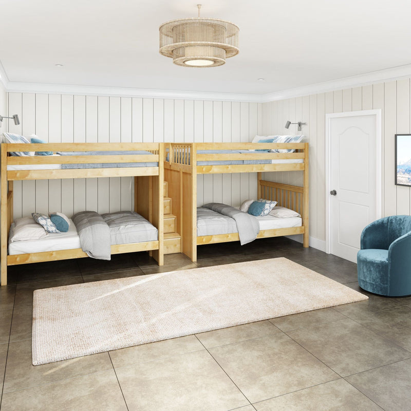 Natural wood twin bunk beds in coastal farmhouse kids' bedroom with white shiplap walls, pendant light, neutral bedding and teal accent chair