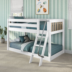 White wooden kids' bunk bed with angled metal handrail ladder, teal bedding, striped wallpaper and plush toy in children's bedroom