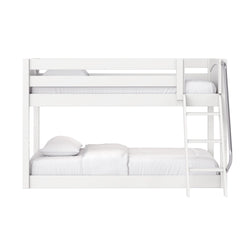 White wooden twin-over-full bunk bed with ladder and guardrail, modern kids' loft bed with white bedding