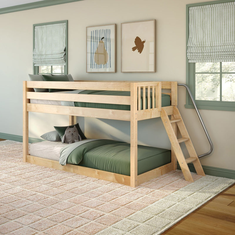 Wooden bunk bed in kids' bedroom with green bedding, striped Roman shades, minimalist framed art, plush toy and textured area rug